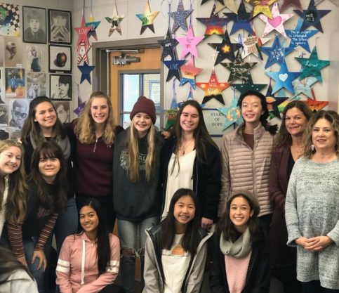 Stars of HOPE club in California create a "Wall of HOPE" in a classroom.