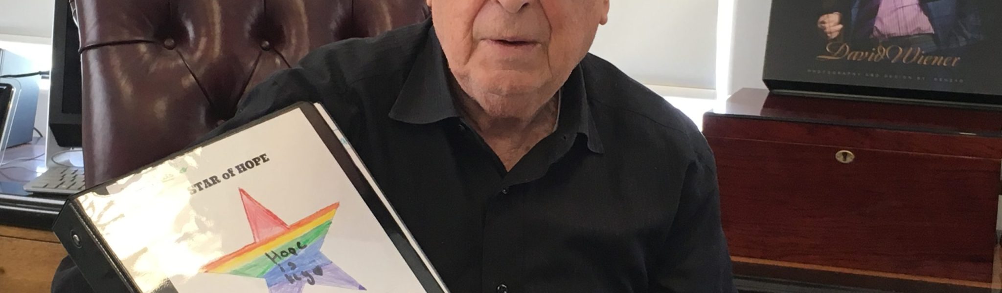 Holocaust survivor, David Weiner, was honored with paper